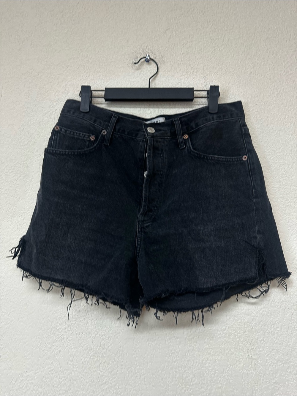 Agolde womans black cut off denim shorts size 29